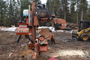 This portable sawmill cuts logs up to 21 feet long!